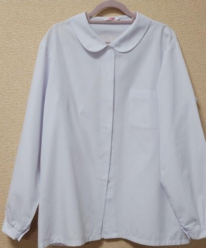 「近隣火災より洗濯後の画像の服をベランダの」の質問画像