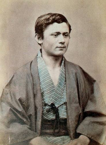 「この写真の、人物」の質問画像
